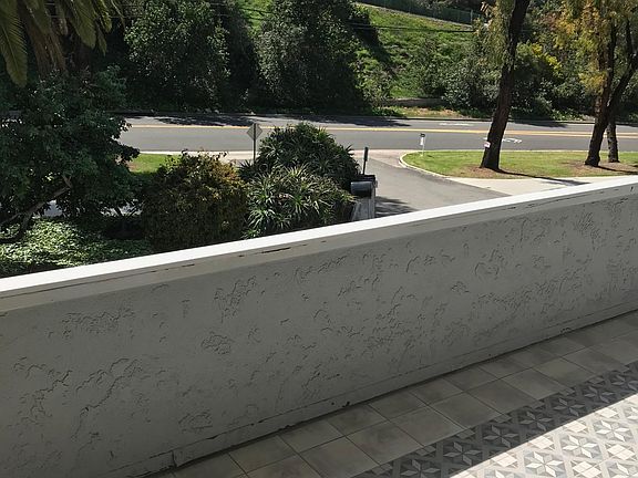 Front balcony with barbecue. And drop down awning. All new tile