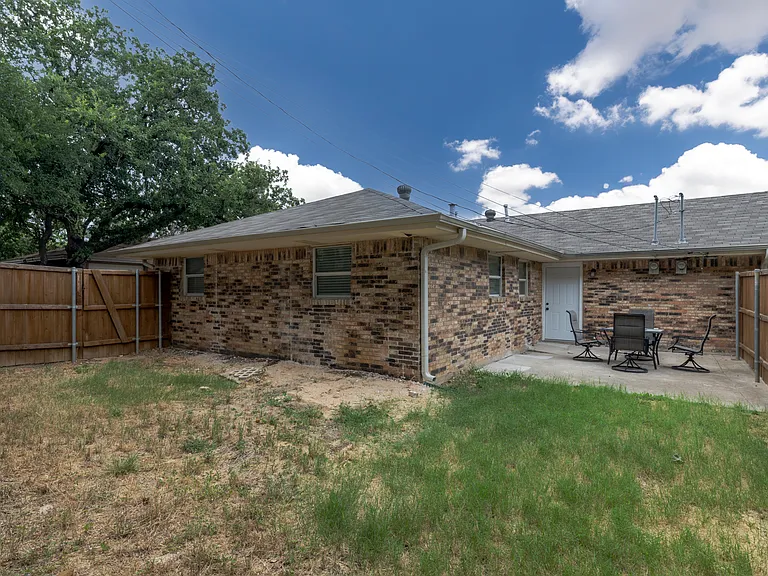 Fully-fenced backyard for your fuzzy friends to run around and an outdoor dining area seating 4.