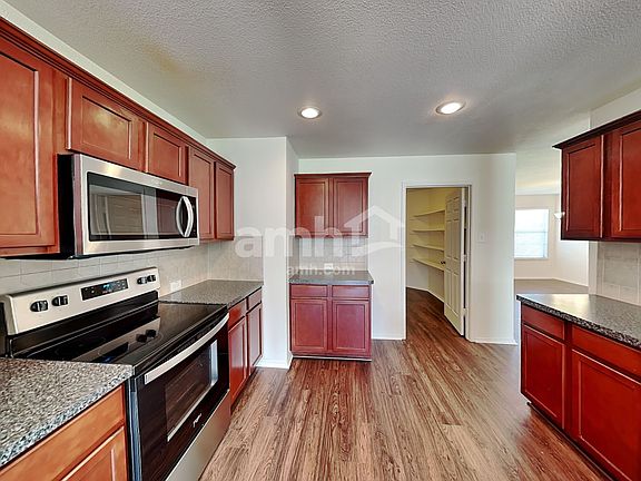 4th image of 9213 Whistlewood Dr