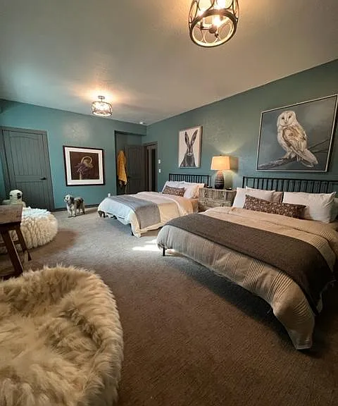 Basement level bedroom with 2 queen beds
