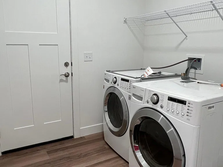 Laundry Room with Garage Access (Washer and Dryer available)