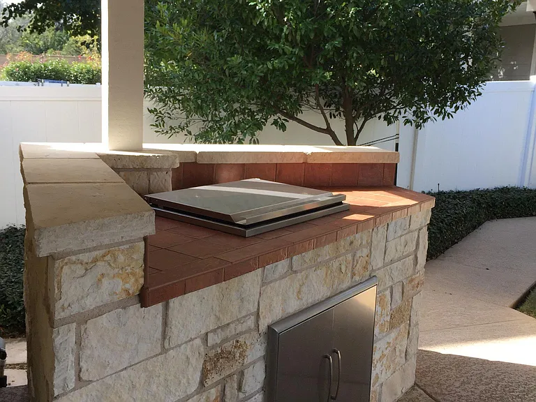 Stainless Steel Built-in Cooler with Cabinets in Limestone