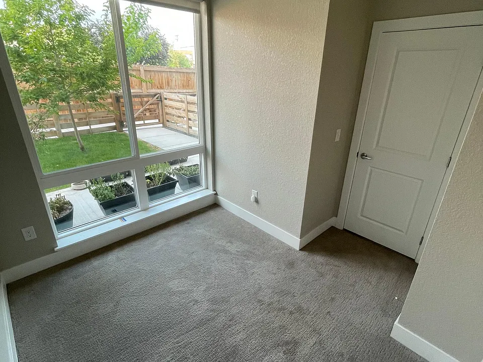 The third bedroom does not have a walk-in closet, but is ideal for an office. East-facing with a view of the front yard.
