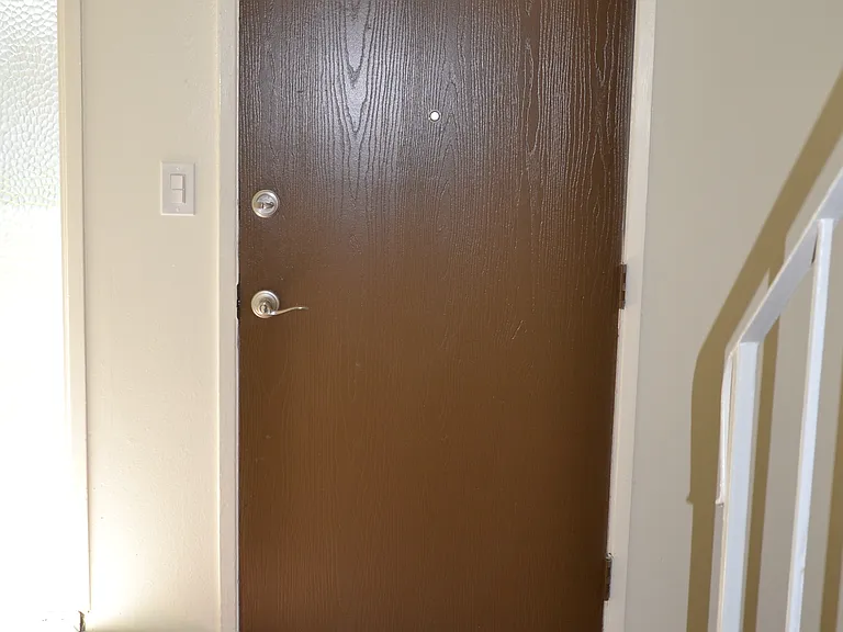 Solid Front Door w/Deadbolt
