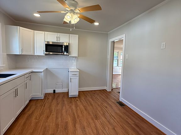 Newly renovated kitchen. Stovetop, dishwasher, and fridge will be provided.