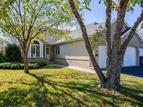 Brick front. Maintenance-free siding. Seamless gutters. Nice landscaping.