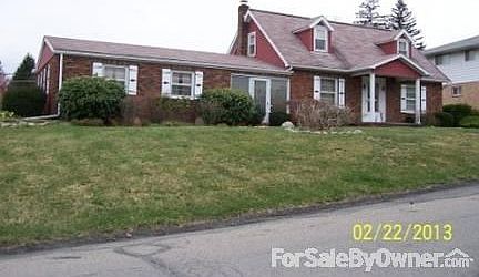 Front
						:
						Garage, breezeway, living rm., front entrance, dining rm.
2 bedrooms upstairs