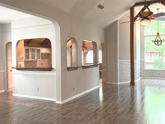 Another View of the new neutral fresh modern paint; family room looking into kitchen and dining.