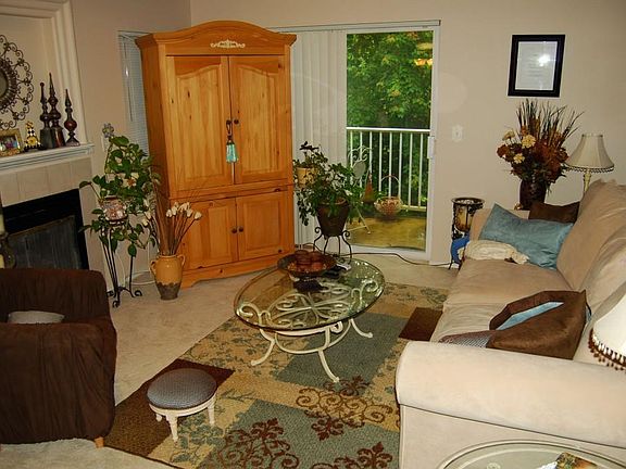 Large living room with access to the balcony porch.