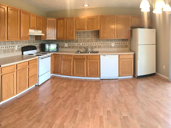 kitchen is spacious and nice, lots of counter space and cabinet space