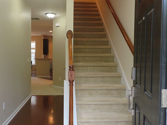 Foyer - continue beyond garage to Great Room, Dining, Kitchen, Half Bath, or up the stairs to Master Suite, 2 Bedrooms, Hall Bath, & Laundry