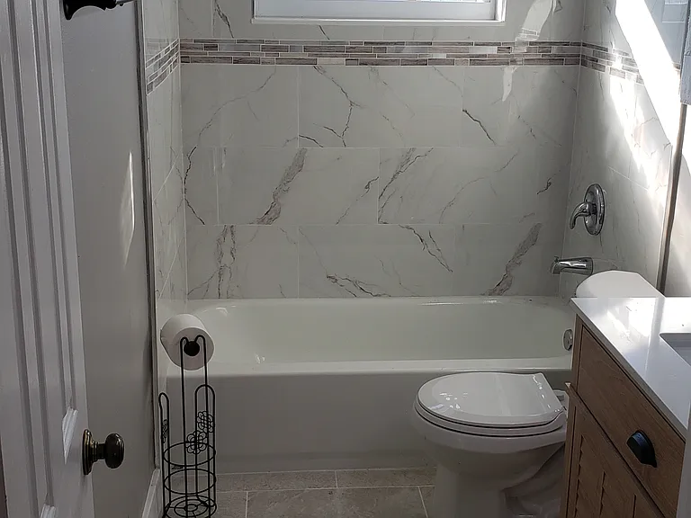 New Remodeled Bathroom Shower, New Vanity and New Tub/Faucets Looking In.