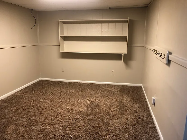 Downstairs living room. Please note flooring is now a beautiful luxury vinyl plank