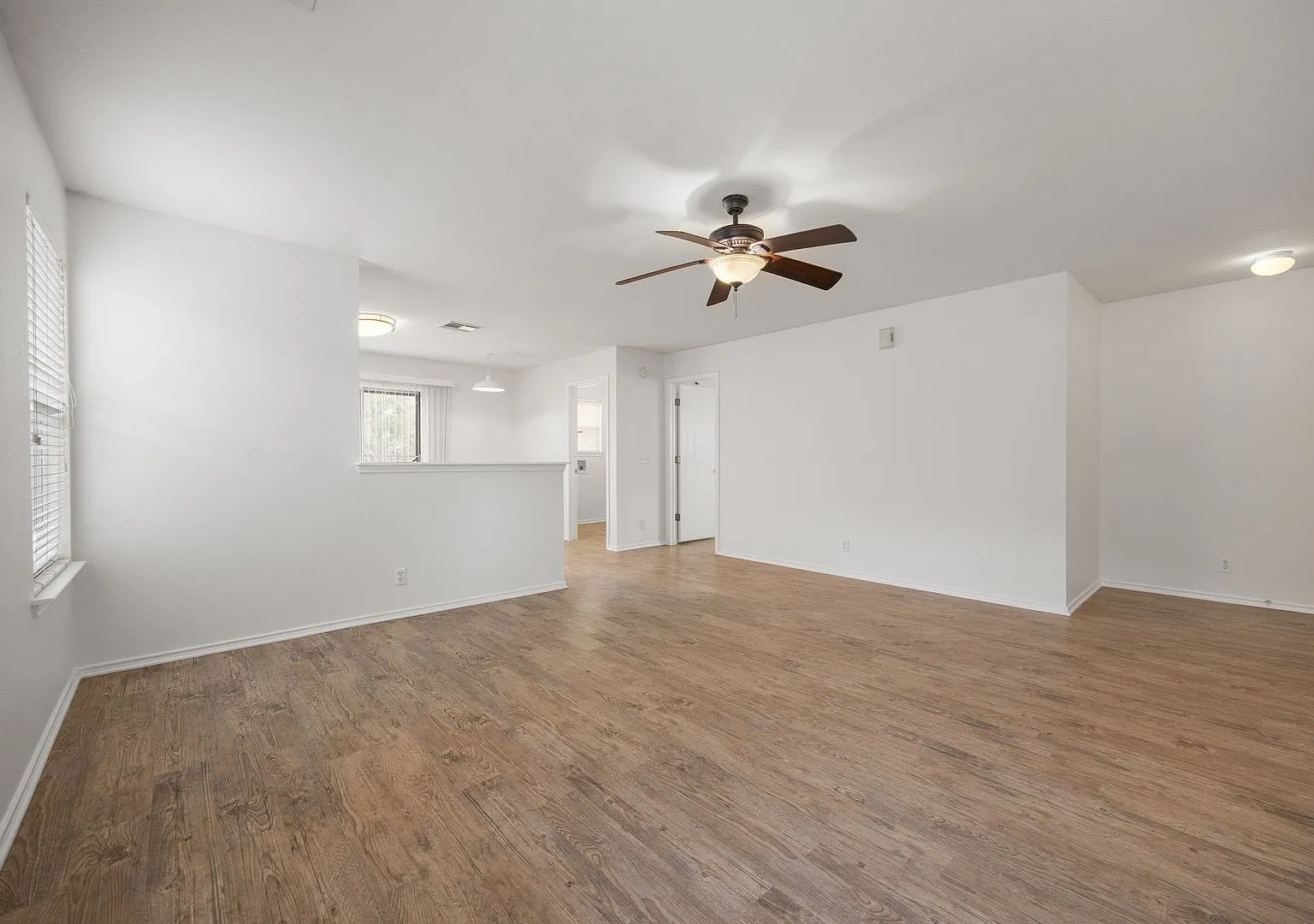 Beautifully Updated 4-Bedroom Home in Manor | Brand-New Flooring & Appliances + Large Private Yard! — Photo 4