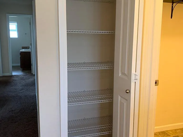 Linen closet at top of stairs.