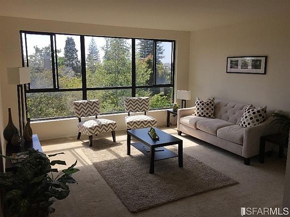 Living room with fresh tree view