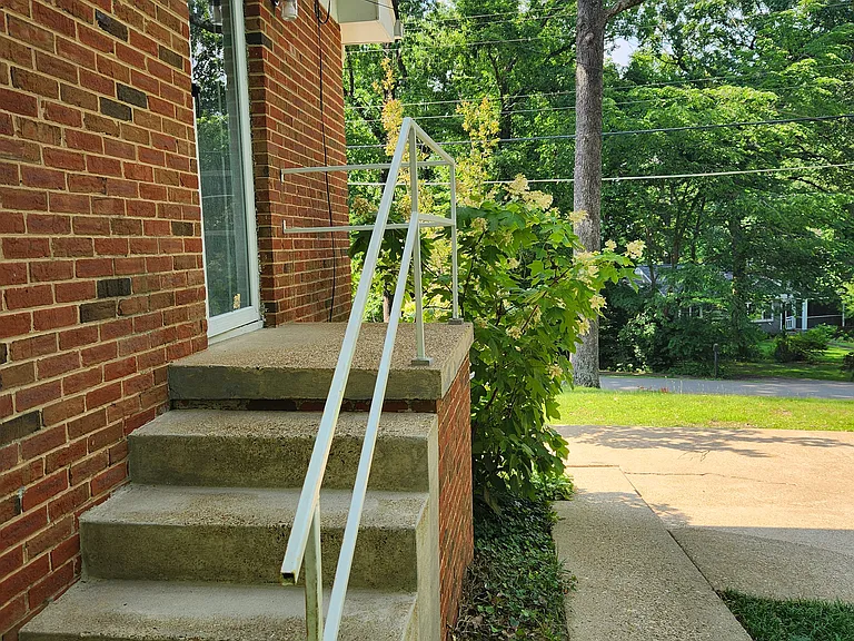 Side entry to kitchen w patio on right, perfect for grilling, or just relaxing outside.