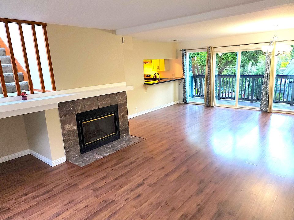 Living room and dining room with bar