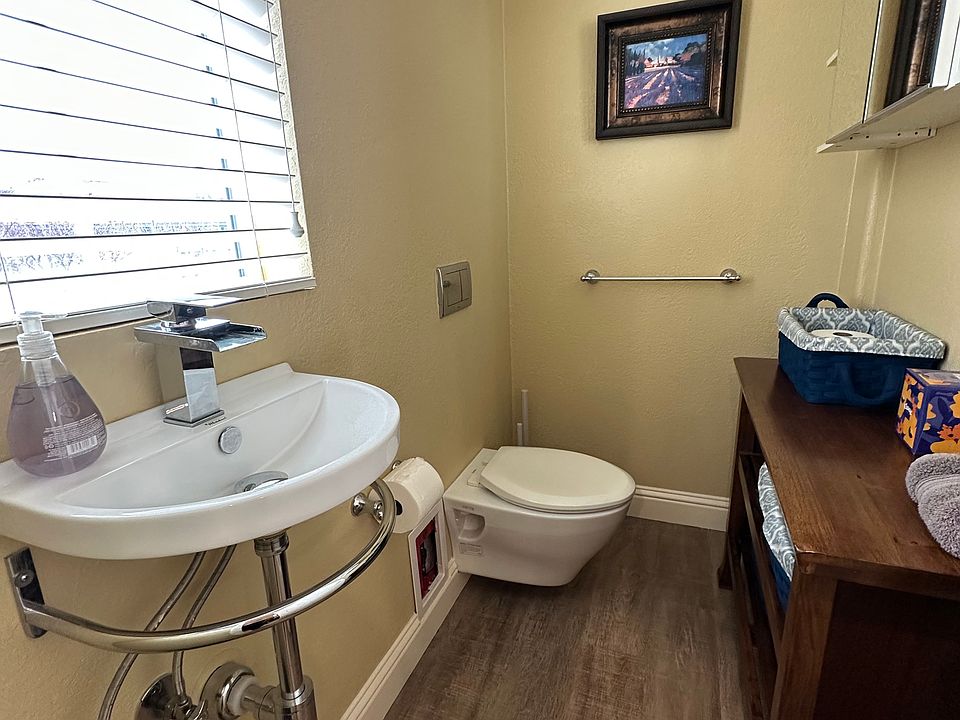 Half bath off of living area for guests