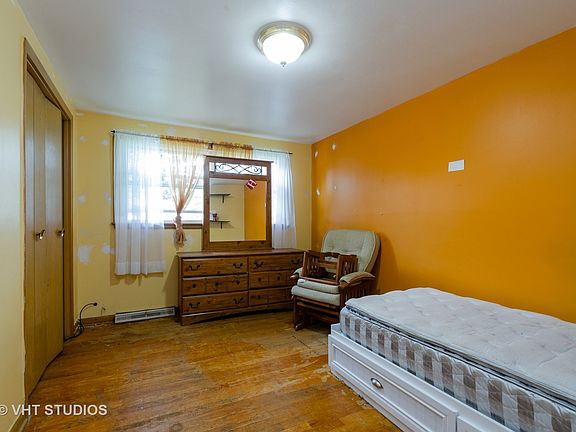 5th image of 1030 E 159th Pl