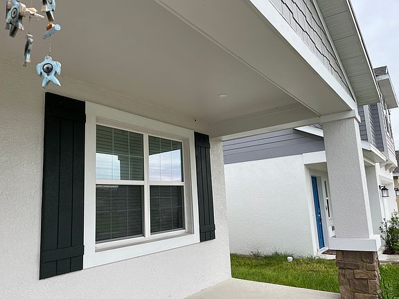 Front unit window facing the garden.