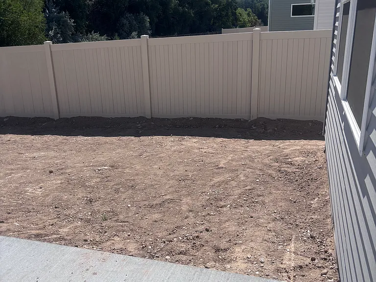 fenced yard... Landscaping and sprinkler coming