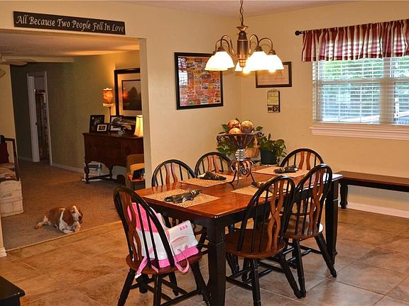 Dining area with view of the living/family room. (And Oscar, the dog)