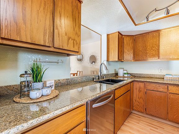 Updated Kitchen with Cut-Out to the View - Granite Counters - Track Lighting>