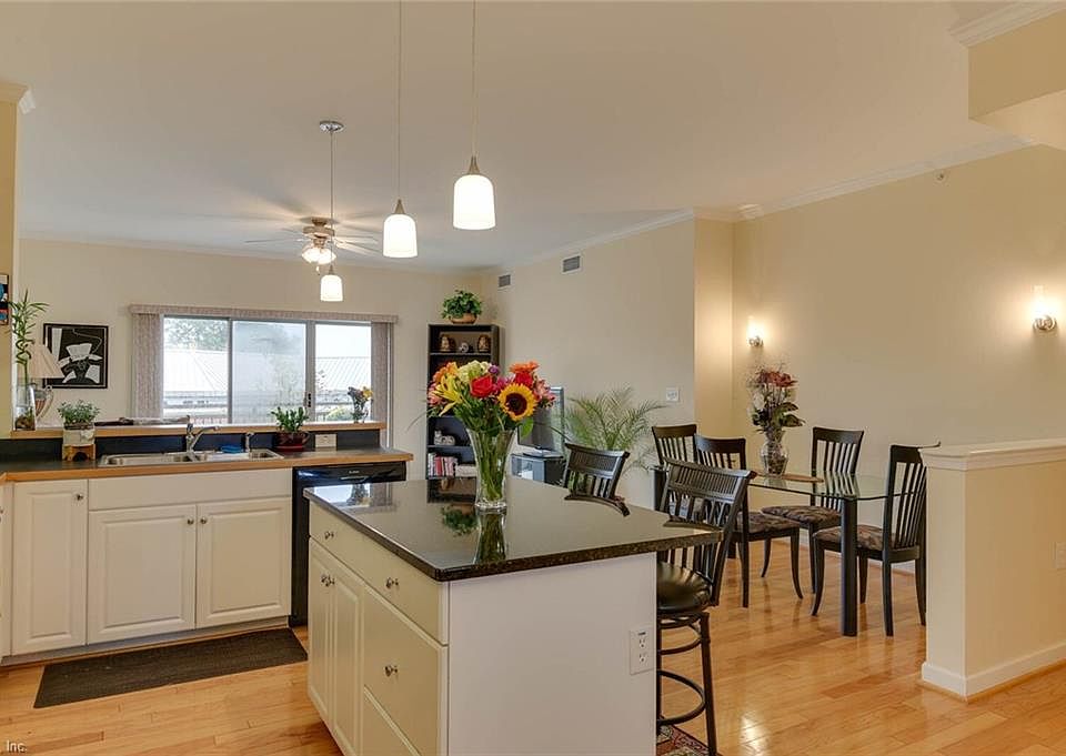 Super sleek condo with hardwood flooring and open concept shared space.