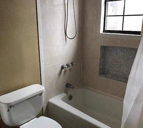 Bathroom Tub with in the wall cubbies
