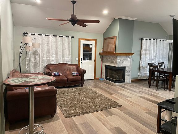 Very open space with corner gas fireplace