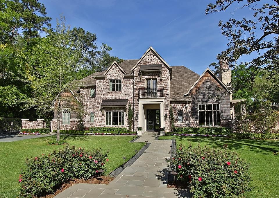 Stunning modern French-styled home custom built by Cunningham Development and Jane Page Design Group in Hunters Creek Village