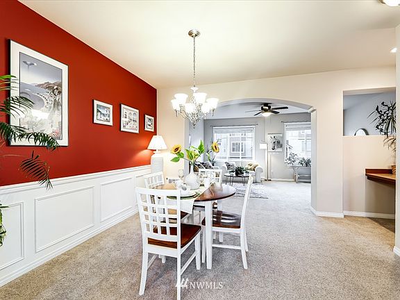Wainscoting in Dining Room, white trim and millwork