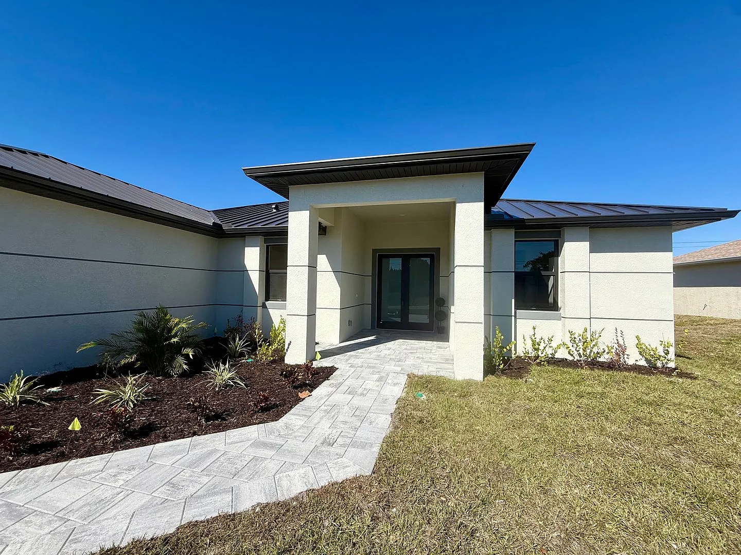 Brand-New Waterfront Luxury in Cape Coral | Heated Pool, Spa, Outdoor Kitchen & 3-Car Garage — Photo 3