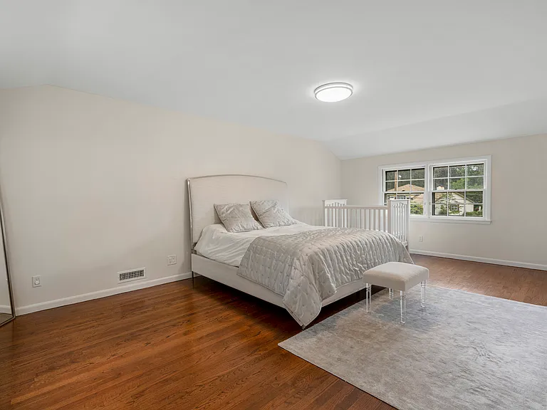 Spacious Primary Bedroom with walk-in closet and en-suite bath.