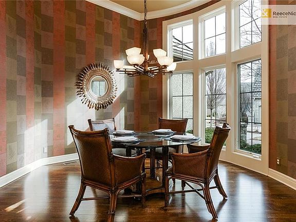 Newly finished hardwood in light and bright Dining Room. Built ins, plus lovely courtyard views of entry.