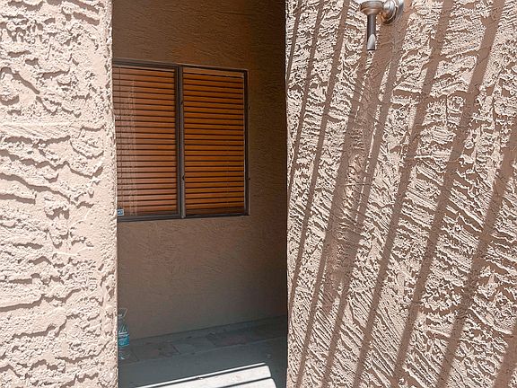 Entry way to front door, kitchen window