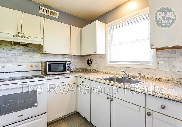 4111 Kinsley Ave — Photo 7