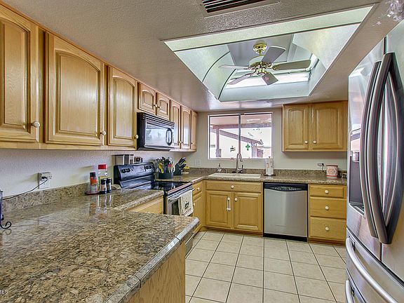 3rd image of 6036 W Harmont Dr