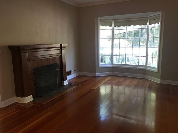 View of the living room and fireplace.
