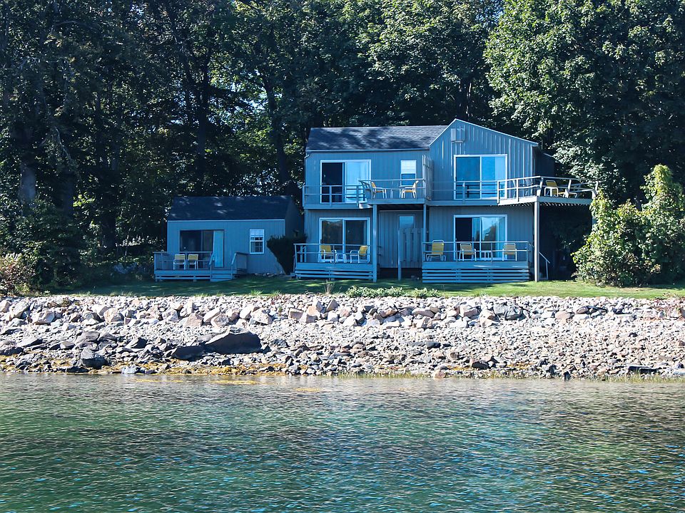 This 2-bedroom unit is the first floor of the building on the right