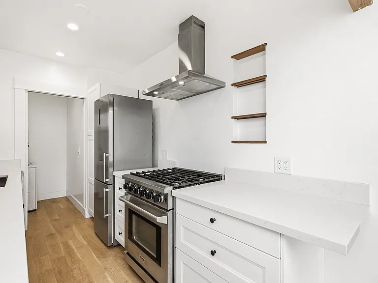 View of the kitchen and the laundry room entrance