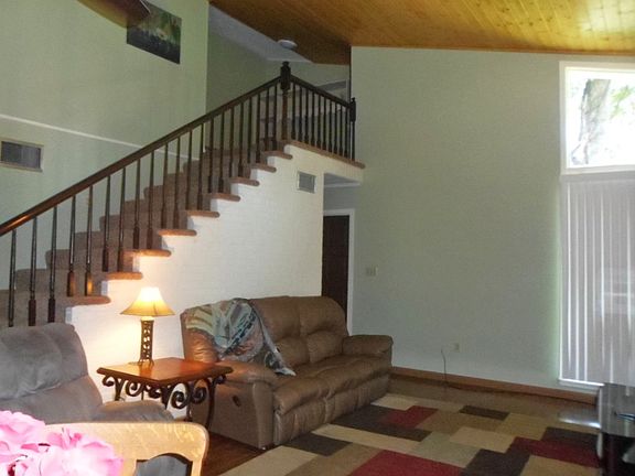 open living room tall ceilin