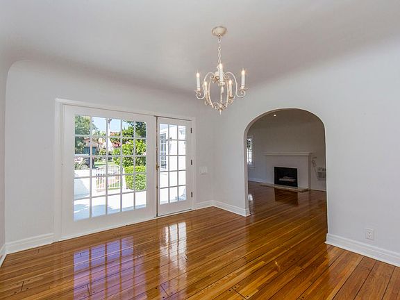 main house dining room with french door to front patio