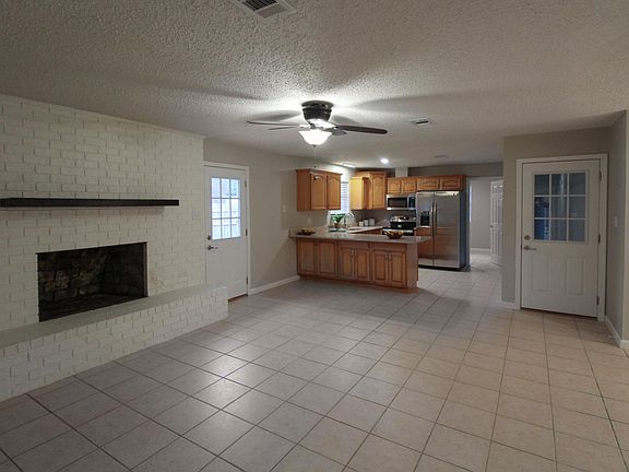 Open floor plan connects kitchen, great room and dining rooms.