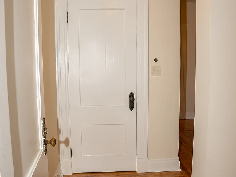 This and the next 11 photos are very representative of the apartment for rent. This shows the entry into the apartment with a amply sized coat closet straight ahead.