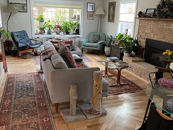 Living room looking from kitchen - Gas fireplace for relaxing in front of and skylight for lots of light.