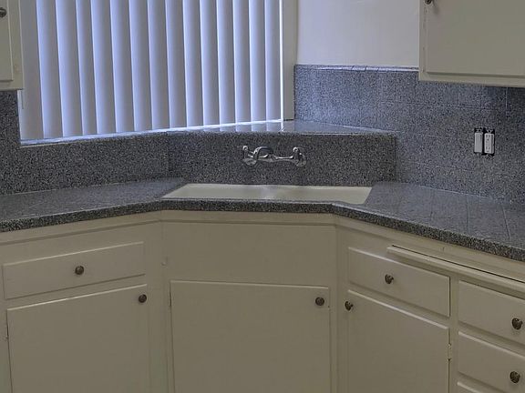 Spacious kitchen with new light fixtures