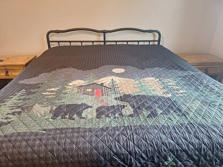 California king bed in front master bedroom.
