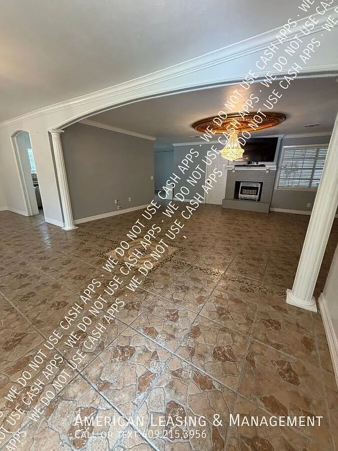Updated 3 Bedroom Home with Fireplace & Fenced Backyard! — Photo 2